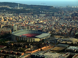 Barcelona stadium seen from above. It is a large and asymmetrically shaped dome.