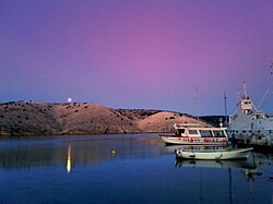 Izlazak sunca i puni Mjesec u Loparu.